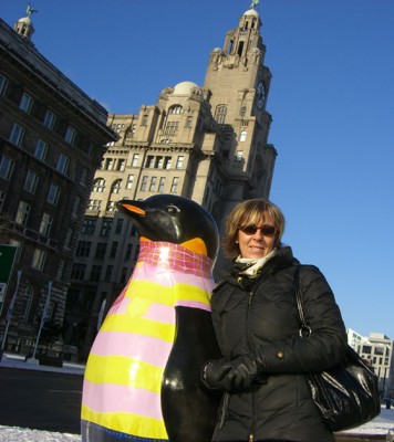 kerstin with penguin and liver birds in the background
